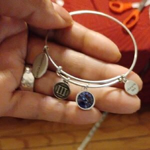 Rodan + Fields Silver Bracelet with Blue Charm